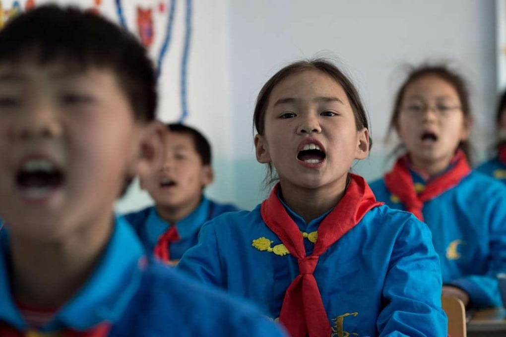 Children learning Manchu at Sanjiazi school in Heilongjiang province. Photo: AFP