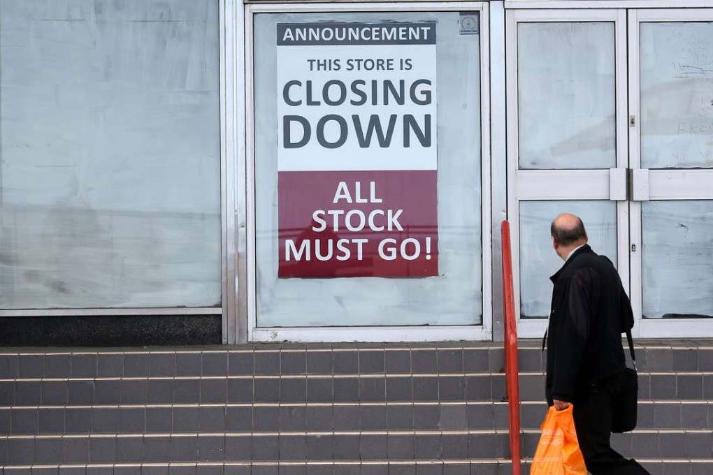 A man walks past a shop which has closed down in Redcar, northeast England, days after Britain’s dramatic vote to quit the European Union. The decision was driven by millions of people in the post-industrial north and centre of England, in working-class towns like Redcar. Photo: AFP