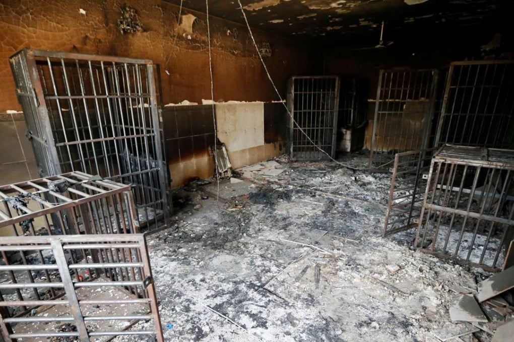 Burnt out prison cells are seen in a makeshift Islamic State prison in Fallujah after government forces recaptured the city. Photo: Reuters
