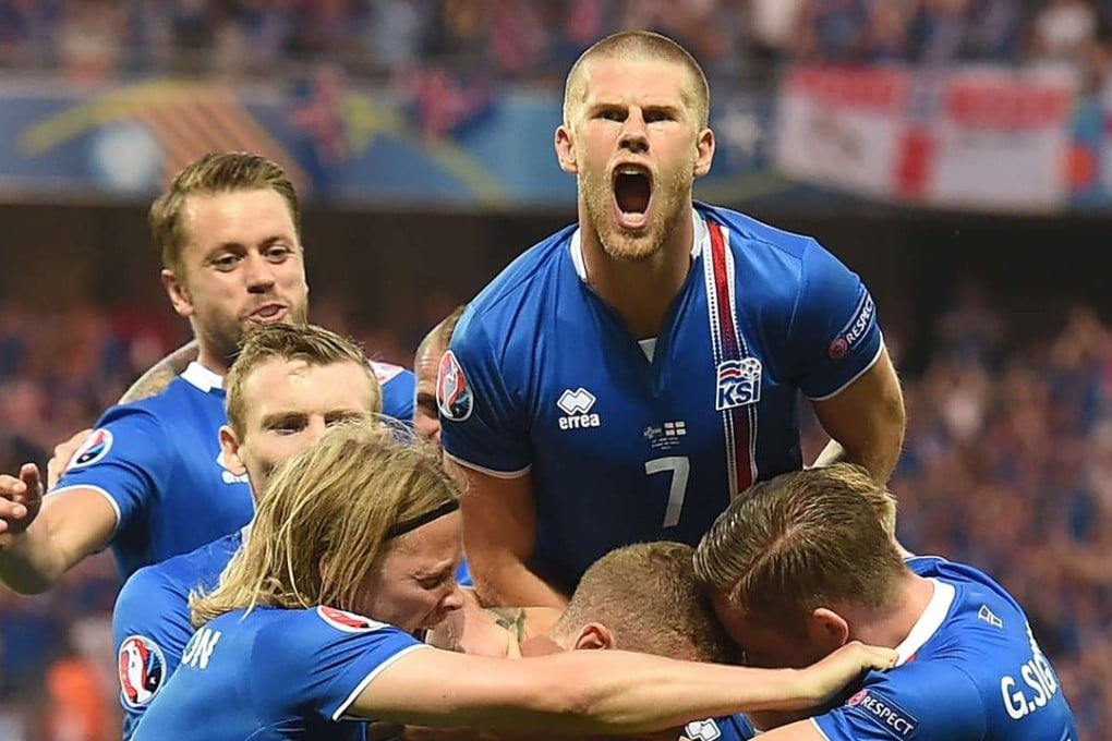 Iceland celebrate a goal against England. Photo: AFP