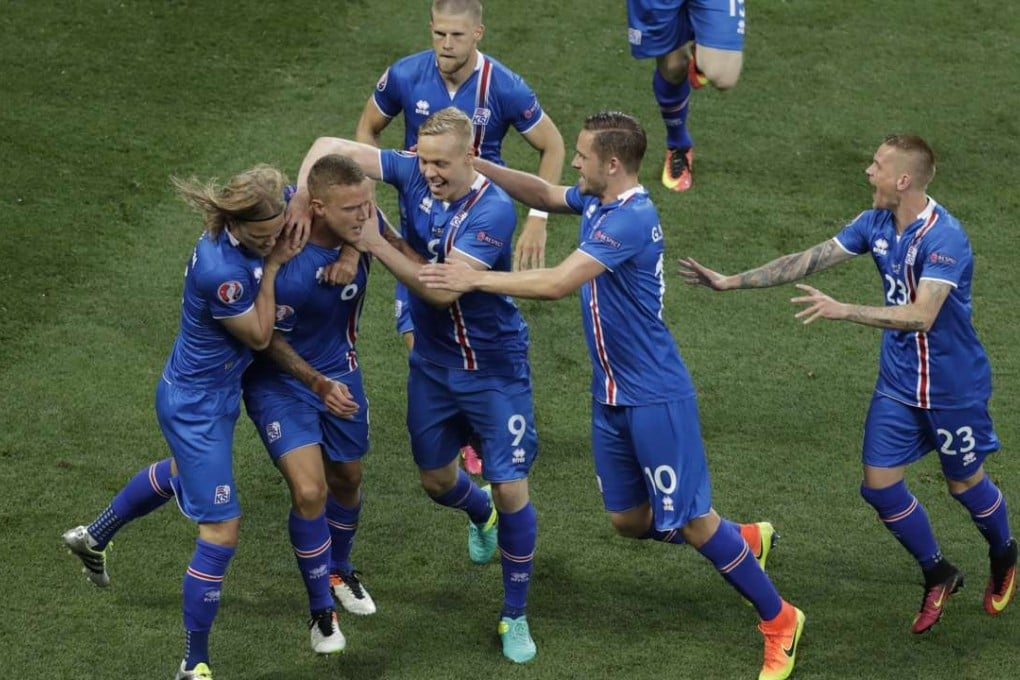 Iceland players celebrate after their teammate Ragnar Sigurdsson, second from left, scored . (AP Photo/Ariel Schalit)