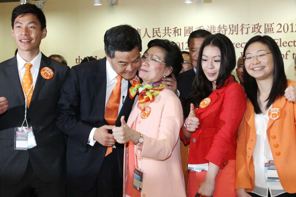 Leung Chun-ying with his family after winning the chief executive election in 2012. Photo: Edward Wong