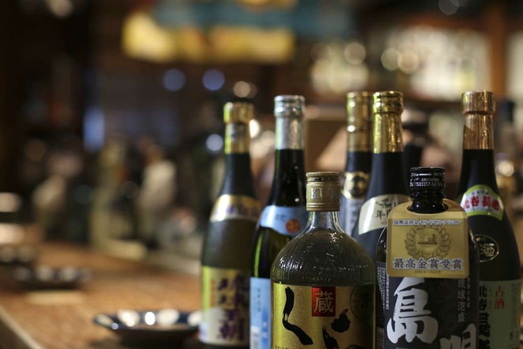 Bottles of awamori at Rakuen in Causeway Bay. Photo: Nora Tam