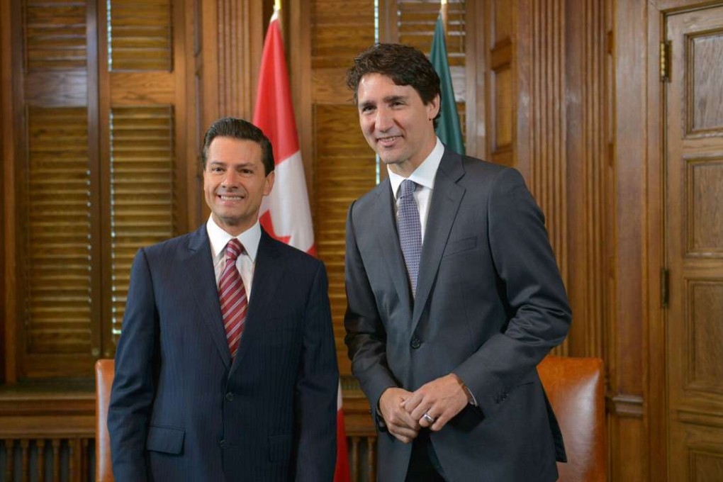 Mexican President Enrique Pena Nieto (left) meets Canadian Prime Minister Justin Trudeau in Ottawa on Tuesday. Photo: AFP