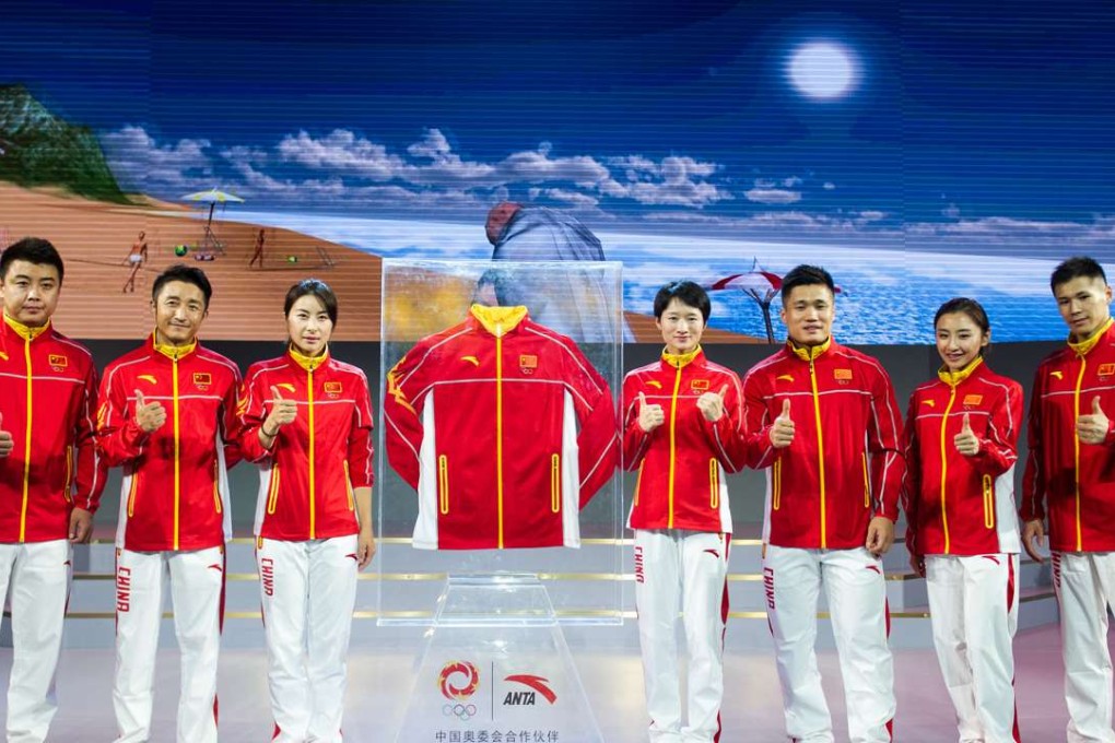 Olympic champion diver Guo Jingjing (third from left), boxer Zhou Shiming (second from left), table tennis champion Wang Hao (left), tae kwon do star Wu Jingyu (fourth from right), weightlifter Lu Xiaojun (third from right), and gymnasts He Wenna (second from right) and Zhang Chenglong pose in the outfits Chinese athletes will wear to medal ceremonies at the Rio Olympics.