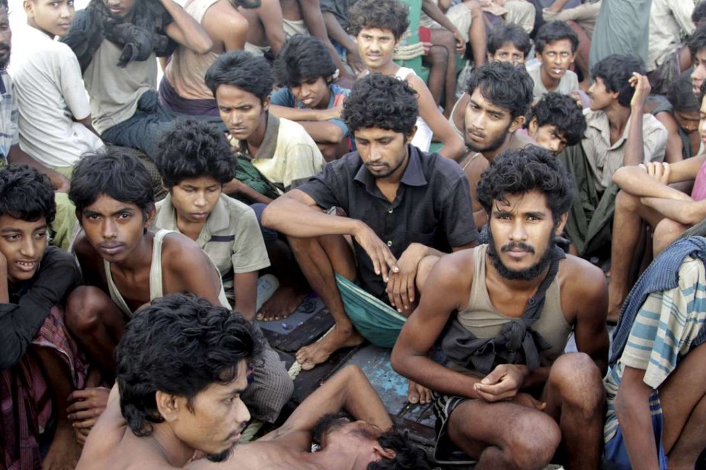 Rohingya Muslims on the deck of a boat while they wait to be rescued. Photo: AP