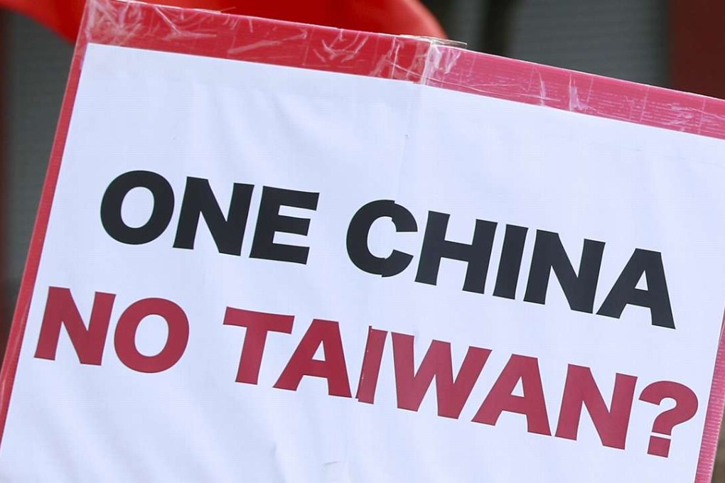 An activist’s placard in Taipei protesting against the meeting between former Taiwan president Ma Ying-jeou and President Xi Jinping in Singapore in November. Photo: Reuters