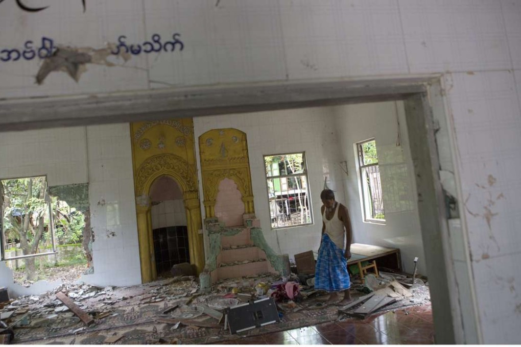 Ibrahim, 67, looks around the destroyed mosque at Thuye Tha Mein village in Waw township, Bago province, Myanmar. Photo: AFP