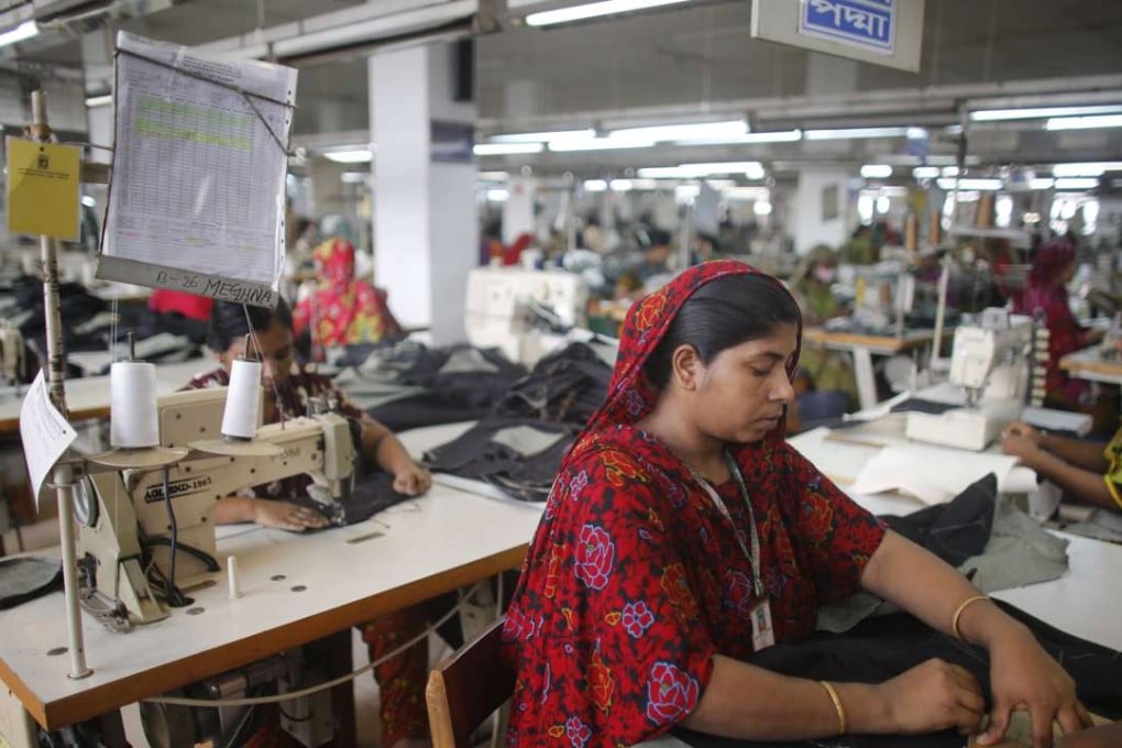 A worker works in a textile factory. Photo: Reuters