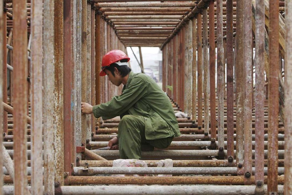Restructuring of over-capacity industries meant that growth has also slowed markedly in those parts of the economy as well. Photo: Reuters