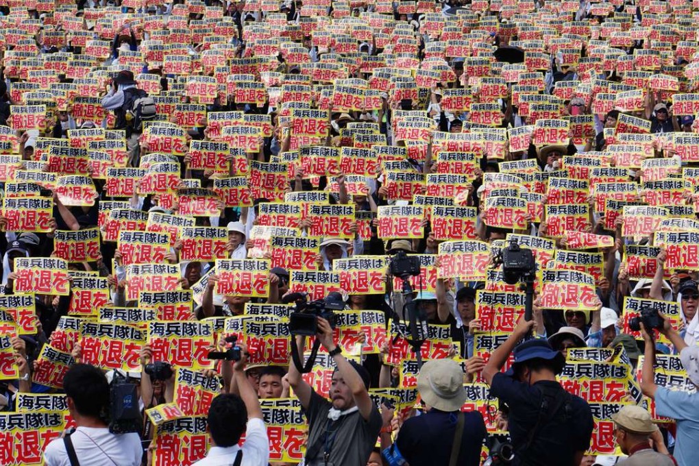 Protesters in Naha, Okinawa, rally last month against the US military presence in Okinawa, as they have done since 1995. Photo: Xinhua