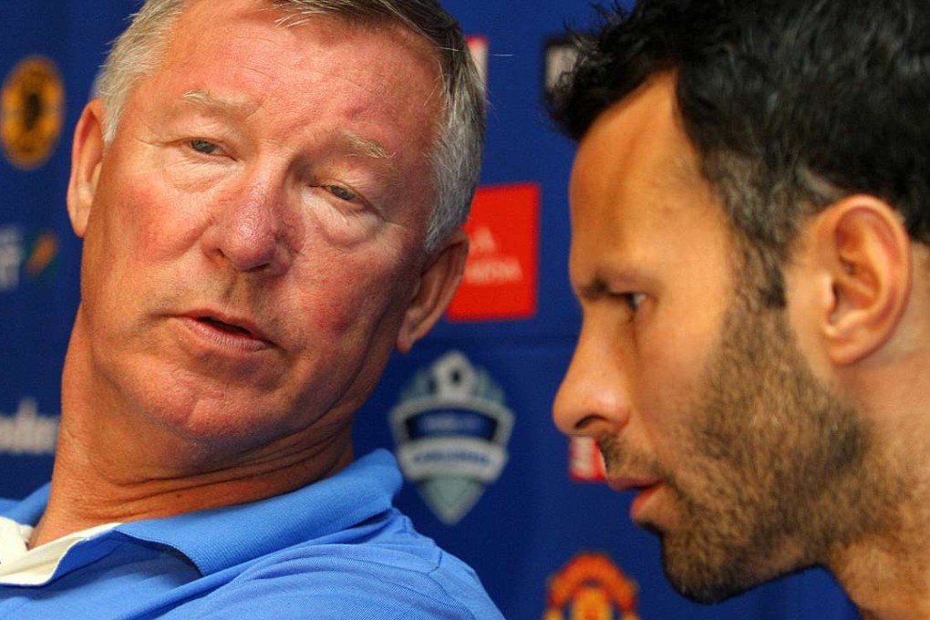 Alex Ferguson chats to Ryan Giggs during a media conference in 2006. The two shared a close relationship during the all-conquering years at Manchester United. Photo: AFP