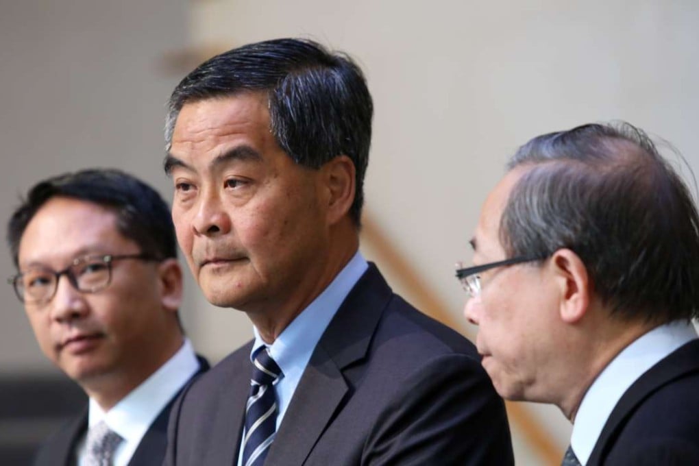 From left, Hong Kong Secretary for Justice Rimsky Yuen Kwok-keung; Chief Executive Leung Chun-ying; and Secretary for Security Lai Tung-kwok announce the delegation to Beijing at the Central Government Office in Tamar. Photo: Sam Tsang