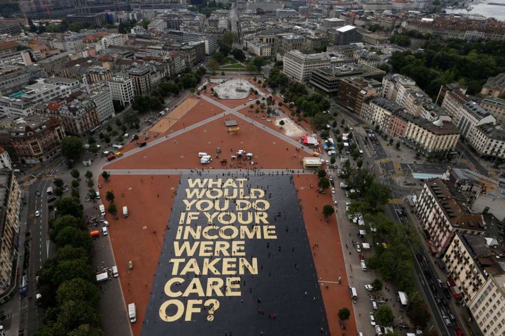 An 8,000-square-metre poster on display in Geneva, Switzerland, ahead of a vote on whether to adopt an unconditional basic income. Picture Reuters