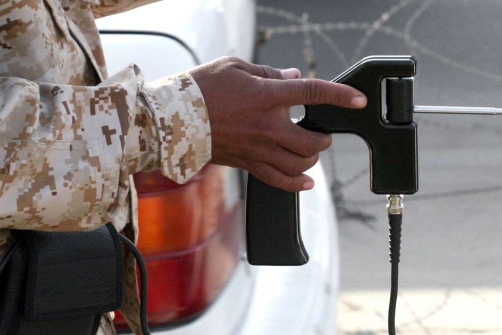 An ADE-651 "bomb detector" in use in Iraq. The fake devices, however, are utterly non-functional. Photo: AFP