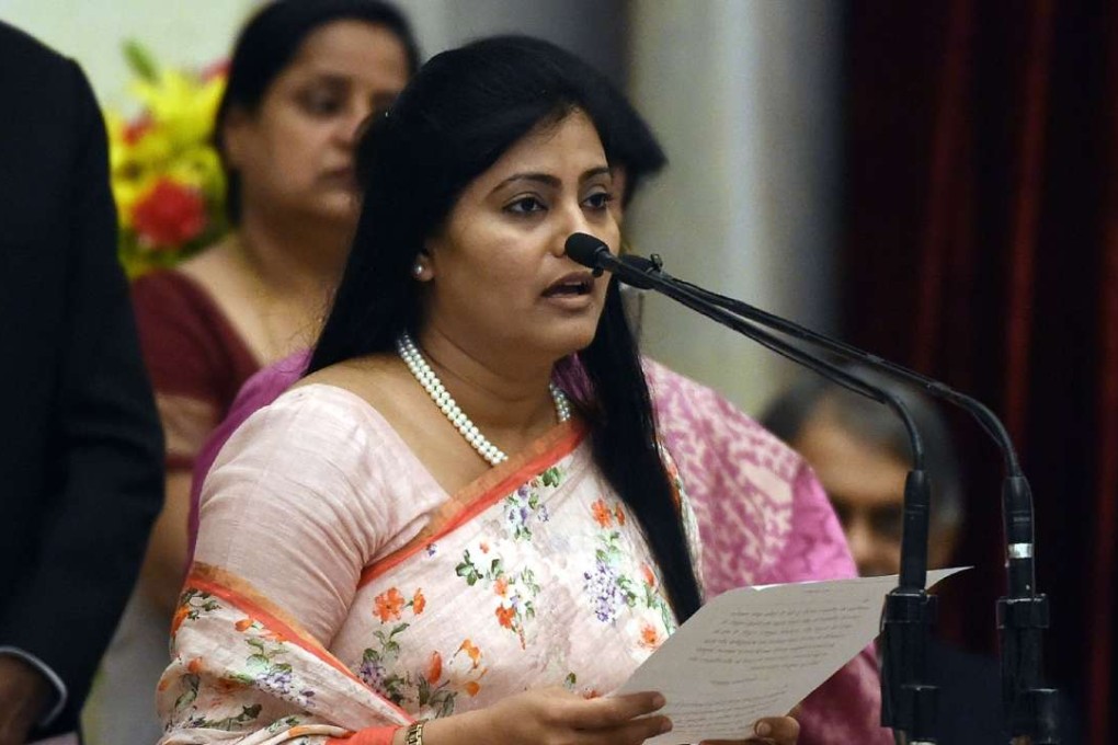 Anupriya Singh Patel takes oath during the swearing-in ceremony of new ministers in New Delhi on Tuesday. Photo: AFP