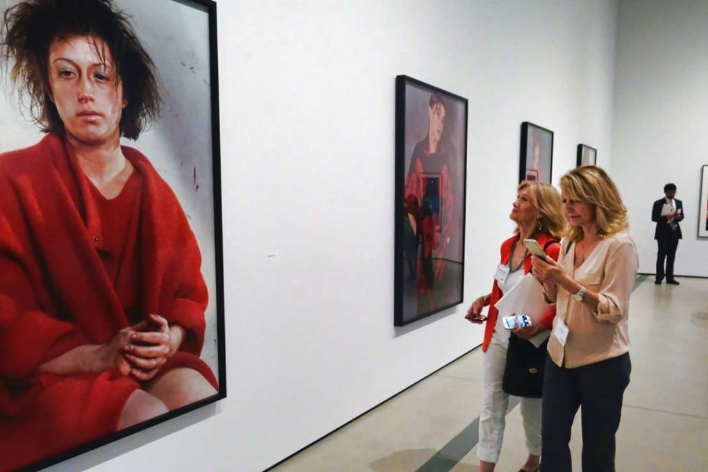 Visitors at a press preview of “Cindy Sherman: Imitation of Life” exhibition at The Broad in Los Angeles. Photo: AP