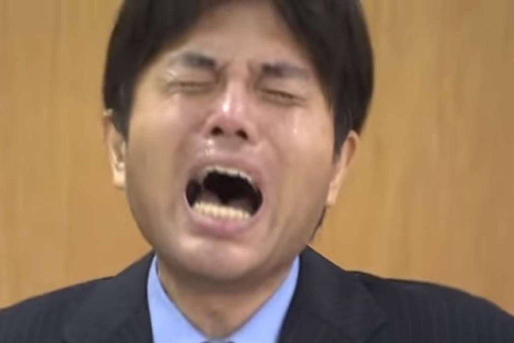 Footage of the bawling middle-aged provincial assemblyman showed him crying and screaming uncontrollably while banging his fists on a desk as tears streamed down his face during a press conference in 2014. Photo: YouTube