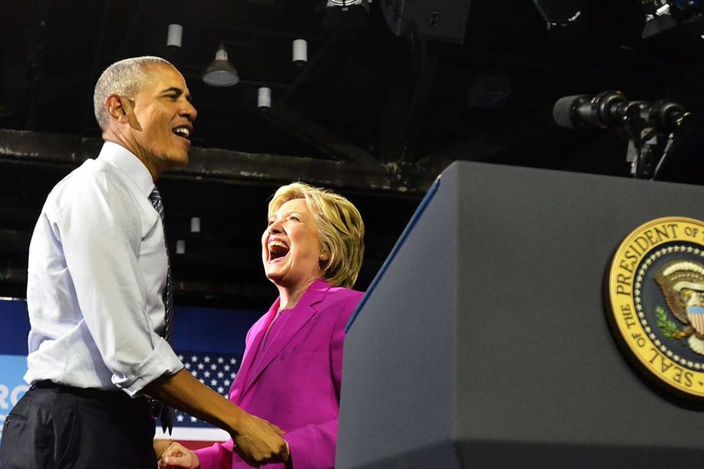President Barack Obama makes his first campaign appearance with presumptive Democratic presidential nominee, Hillary Clinton during a rally on Tuesday at the Charlotte Convention Centre. Photo: TNS