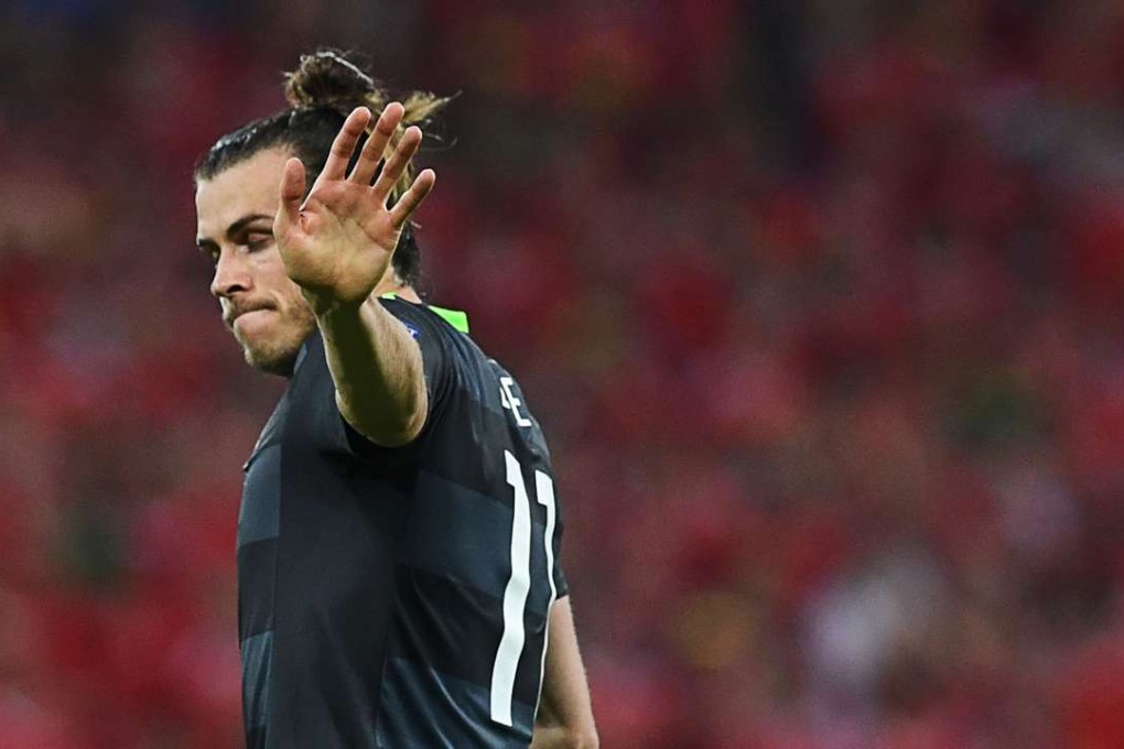 Gareth Bale waves farewell to the fans. Photo: AFP