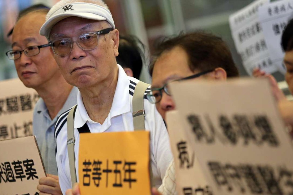 Hongkongers rally outside the Legislative Council building calling for the medical reform bill to be passed. Photo: Dickson Lee