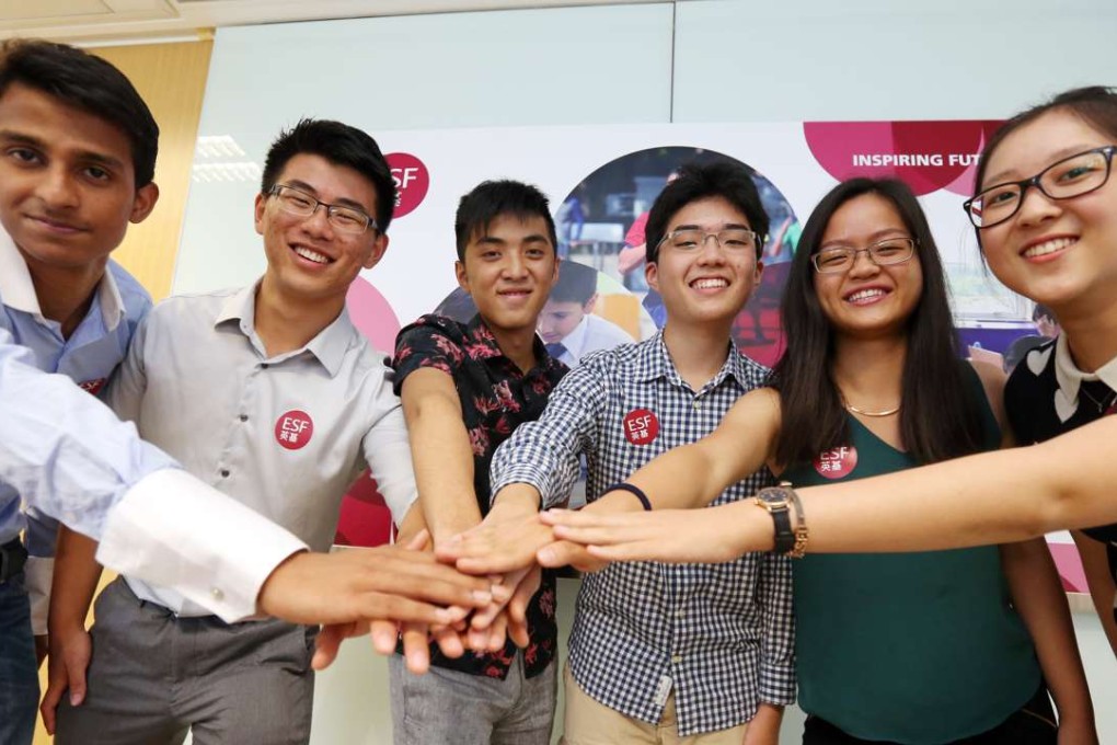 (Left to right) Karthik Ranganatha Subramaniam, Bryan Chan, Garrick Wan, Howard Chae YIi-Hyun, Grace Wang and Yvonne Qian Yi-xuan, from the English Schools Foundation, after they received their IB results. Photo: Dickson Lee