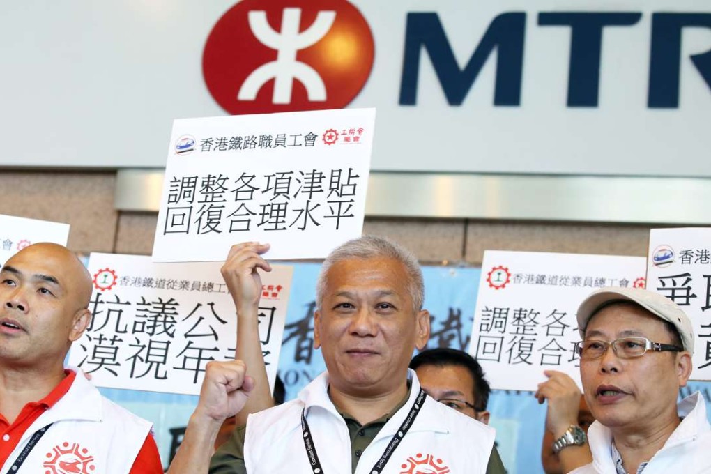 Federation of Railway Trade Unions members protest outside the MTR Corp’s headquarters in Kowloon Bay. Photo: Nora Tam