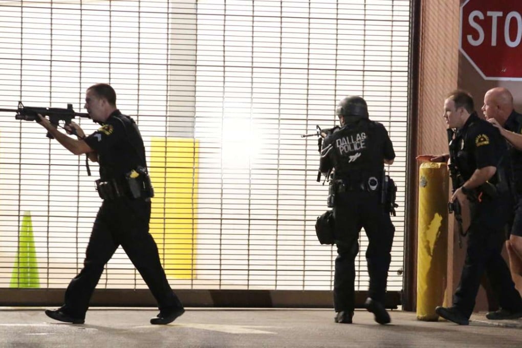 Dallas police respond after shots were fired during a protest over recent fatal shootings by police in Louisiana and Minnesota, July 7, 2016, in Dallas. Photo: AP