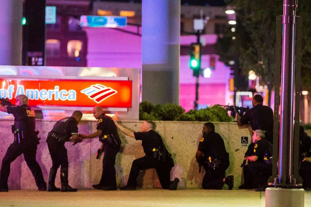 Dallas Police respond after shots were fired at a Black Lives Matter rally in downtown Dallas. Photo: Reuters