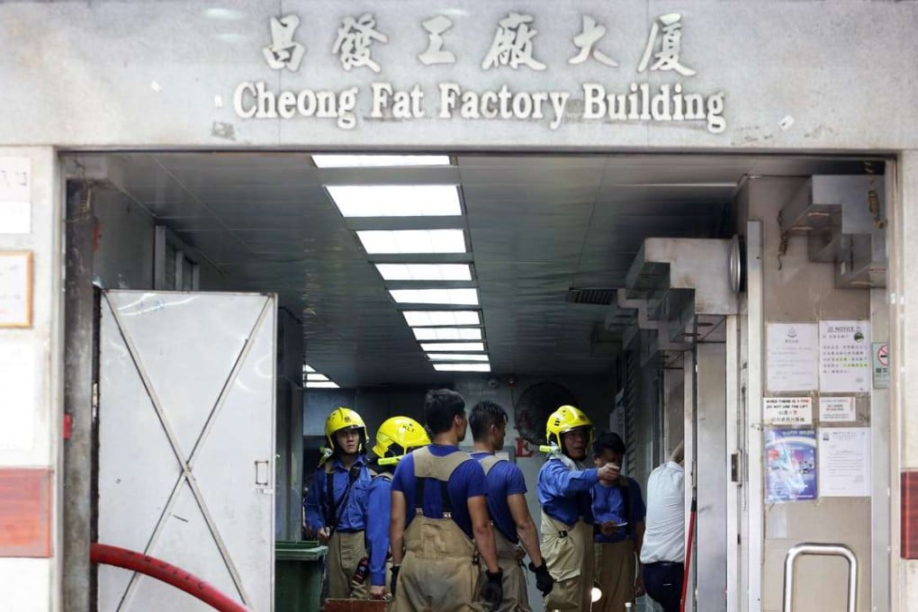 Firemen at the scene of the blaze in Kowloon. Photo: Felix Wong