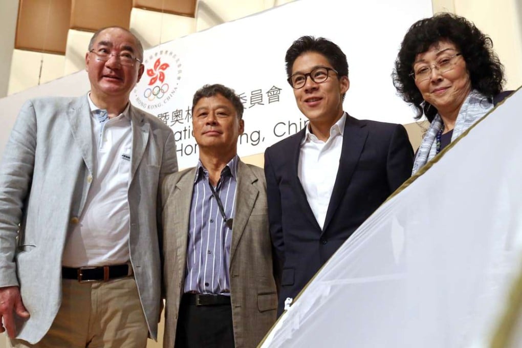 Olympic officials Dr. Julian Chang, Ronnie Wong, Kenneth Fok and Vivien Lau attend a press conference. Will they be joining the athletes in the spartan village or staying in five-star hotels? Photo: SCMP/ K. Y. Cheng