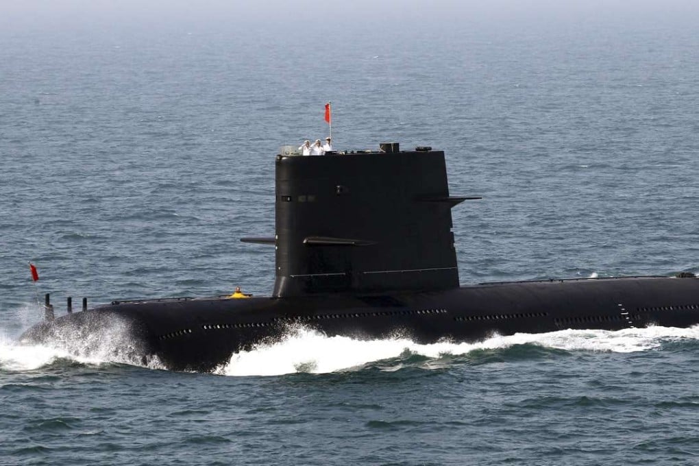 Chinese sailors salute on top of a submarine during the fleet review at a China-Russia joint naval exercise in the Yellow Sea in April 2012. Photo: Reuters