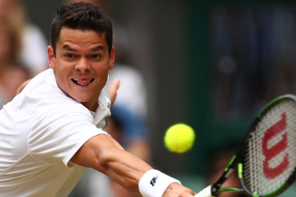 Milos Raonic returns to Roger Federer in their marathon semi-final five-setter. Raonic became the first Canadian man to make a grand slam final. Photo: AFP