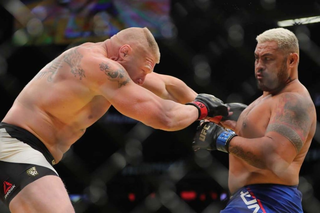 Mark Hunt (right) and Brock Lesnar. Photo: AFP