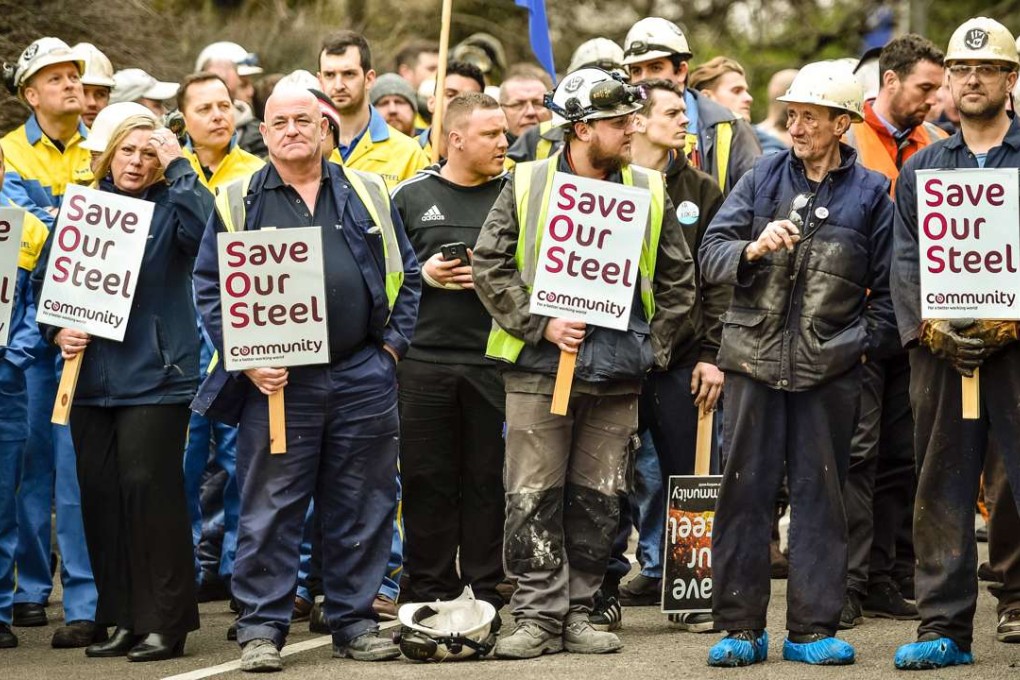 British steelworkers await British Business Secretary Sajid Javid outside Tata Steel's steel plant in Port Talbot, south Wales on April 1, 2016. Photo: AFPfor British Business Secretary Sajid Javid (not pictured) to leave Tata Steel's steel plant in Port Talbot, south Wales on April 1, 2016. Prime Minister David Cameron's government faced damaging claims Friday that its push for closer ties with China is holding back efforts to save 15,000 steel jobs. / AFP PHOTO / POOL / Ben Birchall