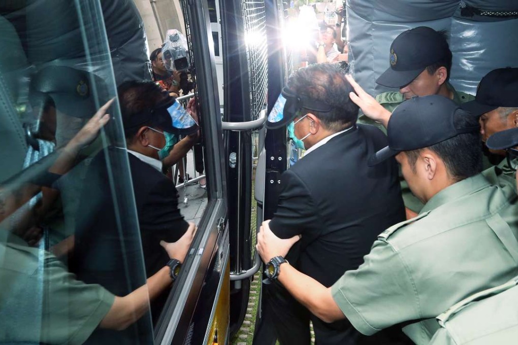 Carson Yeung (centre) was escorted away from the court on Monday. Photo: K. Y. Cheng