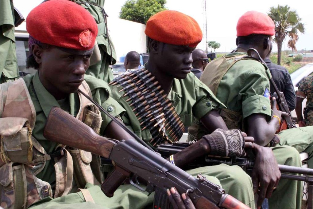A group of opposition soldiers arriving with General Simon Gatwech Dual, the chief of staff of the South Sudan rebel troops, in Juba. Photo: EPA