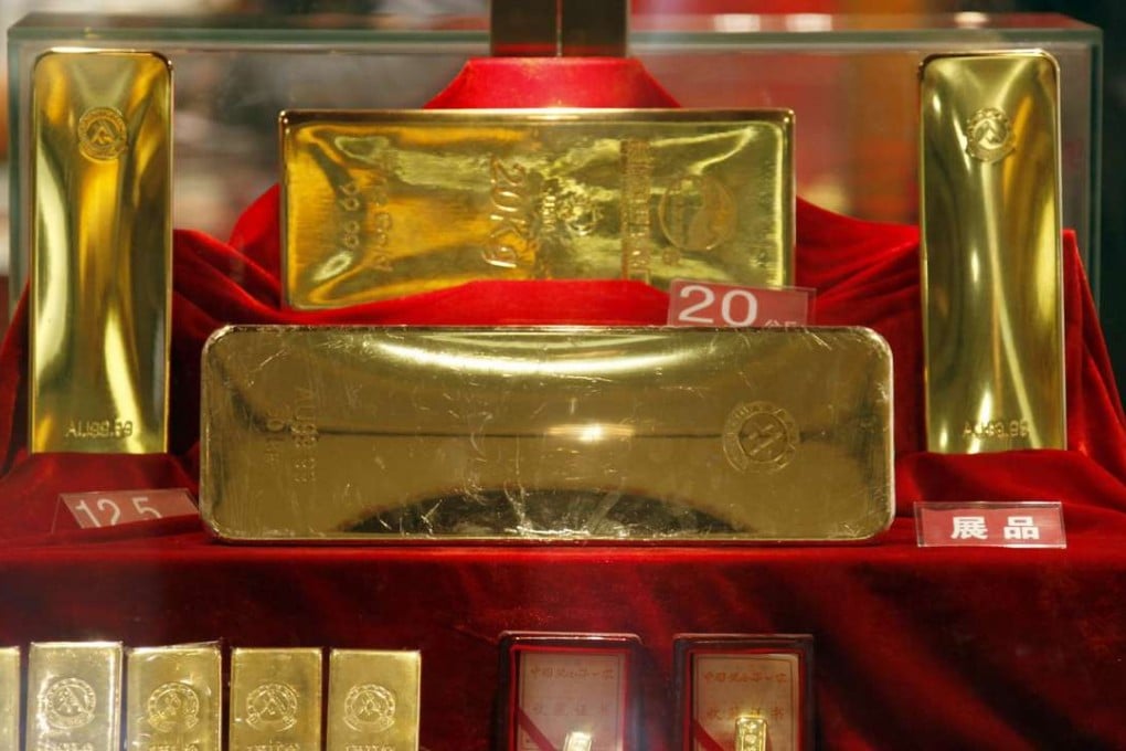 Gold bars on display in a Beijing gold store. Photo: David Gray, Reuters