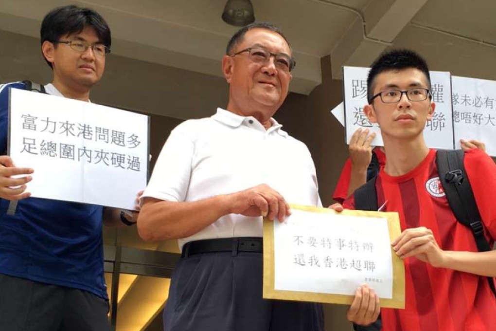 HKFA chairman Brian Leung meets disgruntled fans at the FA headquarters in Ho Man Tin. Photo: Chan Kin-wa