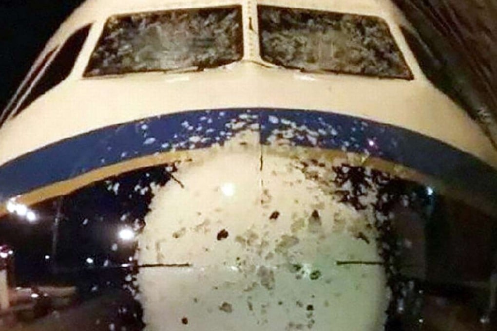 The China Southern Airlines aircraft was severely damaged after flying through a hailstorm, but there were no reports of injuries to passengers or crew Photo: SCMP Pictures