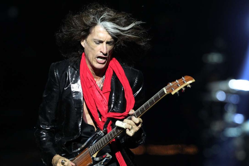 Lead guitarist Joe Perry of American rock band Aerosmith performs in Singapore on 2015. Photo: AP
