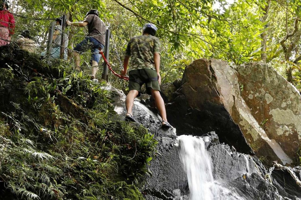 Yanoda Rainforest Cultural Tourism Zone, where treks up steep hillsides offer spectacular views from high above the canopy.