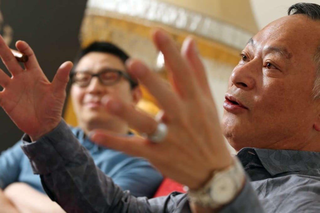 Film director Johnnie To (front) with his protege, producer-screenwriter Yau Nai-hoi. Photo: K.Y. Cheng