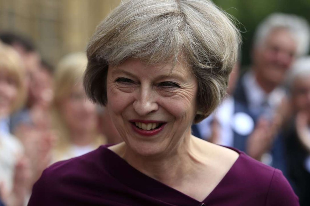 Theresa May makes a statement outside the Houses of Parliament in London. She will be the UK's next prime minister. Photo: AP