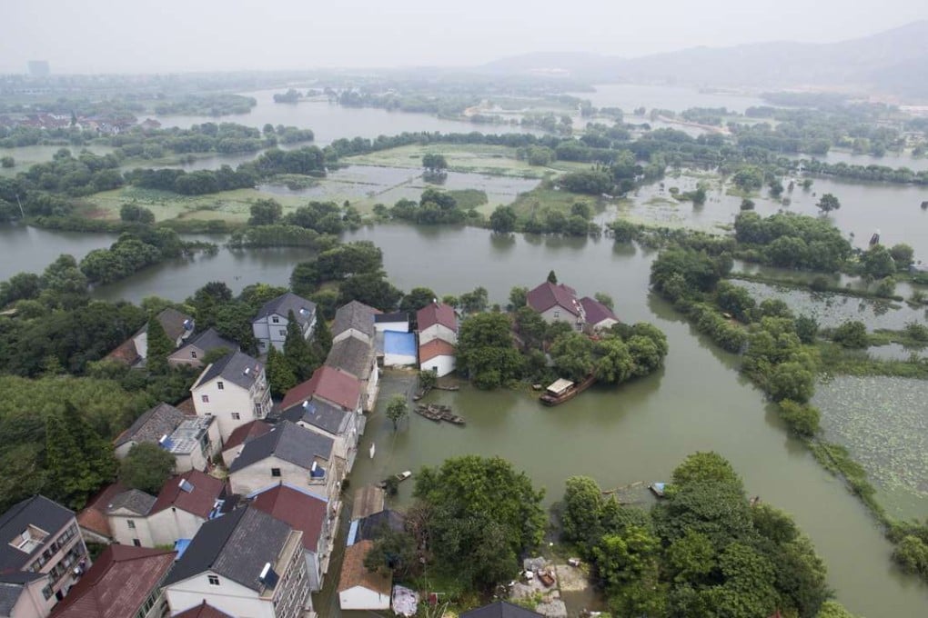 An aerial photo taken on Monday shows the flooded village of Dadangyang at a tourist resort in Changxing county in the city of Huzhou, Zhejiang province. Influenced by the high water level of Lake Tai, floods in Huzhou have affected 15,474 local residents and destroyed about 4,340 hectares of crops. Photo: Xinhua