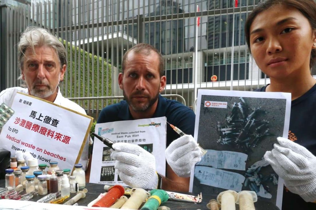 Paul Zimmerman , Moran Zukerman and Julia Leung from Plastic Free Seas, handed the waste to the government. Photo: K. Y. Cheng