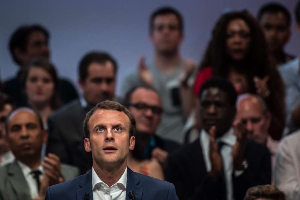 French economy minister Emmanuel Macron delivers a speech during a rally for his recently launched political movement 'En Marche!', in Paris on Tuesday. Photo: EPA