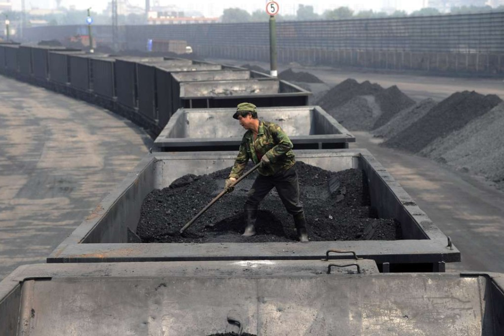 Coal being transported by train in Taiyuan, Shanxi province. Wang Yixin, the deputy provincial governor, led a group of representatives from nine coal companies to Beijing on Wednesday, to lobby institutional investors for funding. Photo: AP