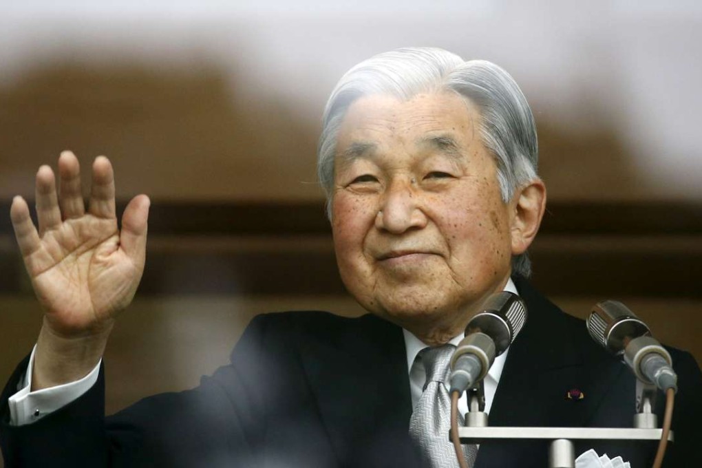Japan's Emperor Akihito waves to well-wishers outside the Imperial Palace in Tokyo. Photo: Reuters