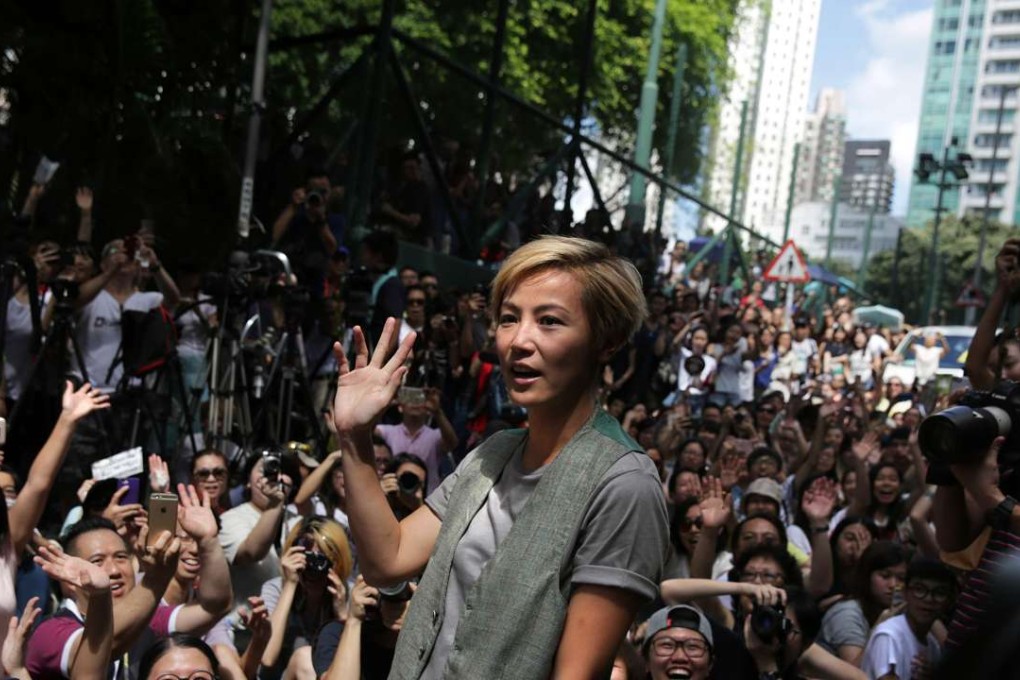 Canto-pop singer Denise Ho Wan-sze waving to fans in June following the Lancôme controversy. Photo: AFP